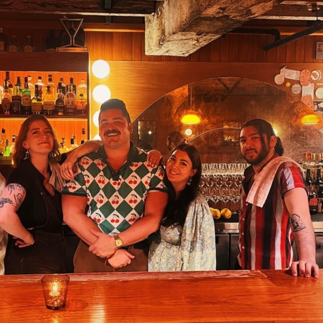The Double Deuce Team: Alicia Clarke, Sebastian 'Cosmo' Soto, Claudia 'Beryl' Morgan and Michael Jury stand behind the bar at Double Deuce Lounge